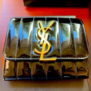 Authentic Yves Saint Laurent Vicky Patent Leather Black Trifold Wallet.